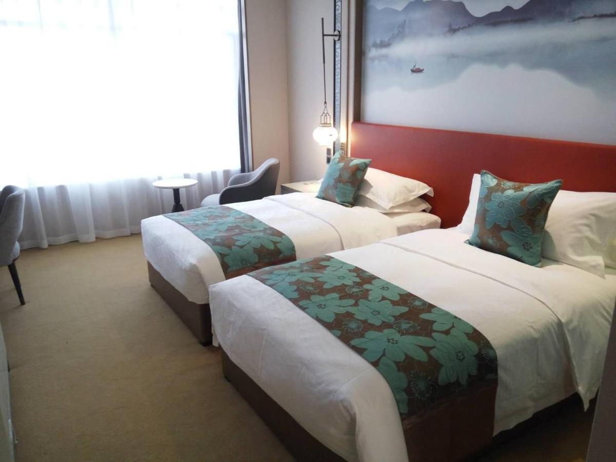 Weiselect Wanghu Hotel Кунмин Екстериор снимка